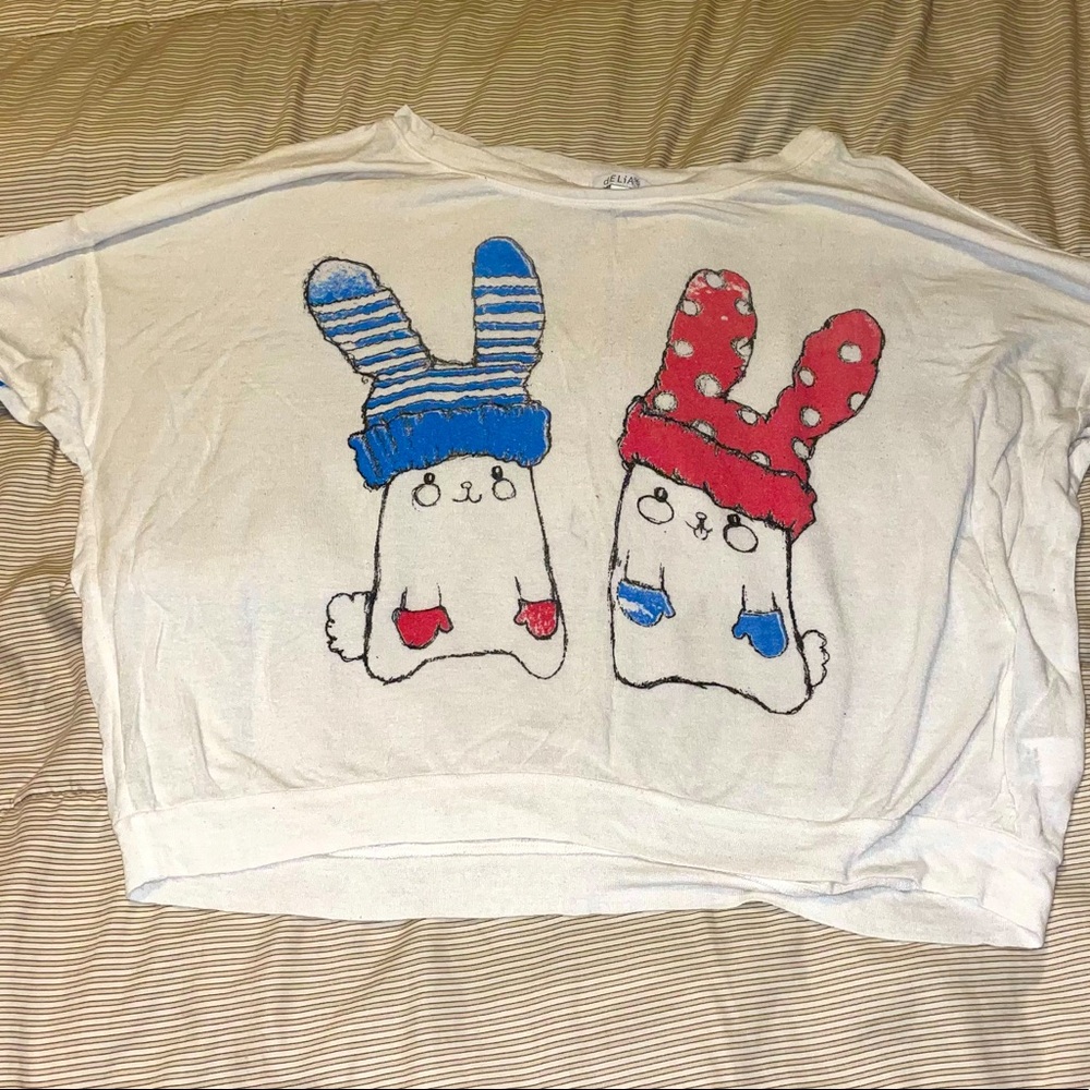 Delia’s long sleeve snow bunny graphic tee